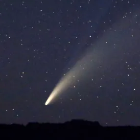 Comets: Frozen Messengers of the Cosmos